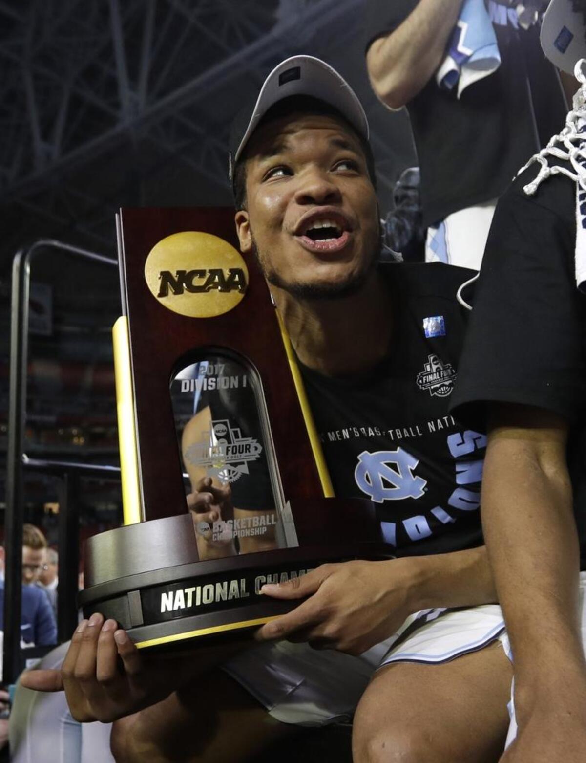 In Glendale, Ariz., North Carolina’s Kennedy Meeks celebrates after the Tar Heels’ win against Gonzaga to claim the NCAA men’s basketball championship on April 3. On Thursday, his high school alma mater in Charlotte hosted “Kennedy Meeks Day.”