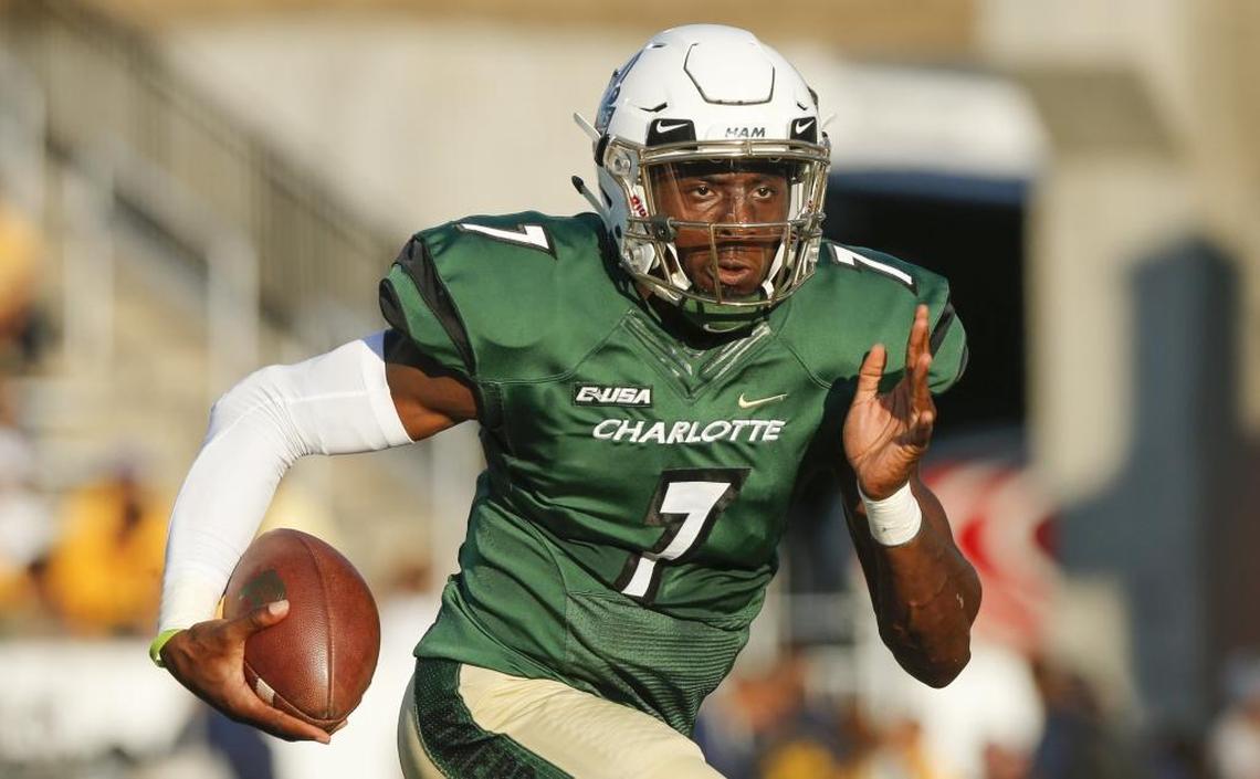 Charlotte 49ers quarterback Hasaan Klugh runs for yardage against North Carolina A&T during Saturday’s game at Jerry Richardson Stadium.