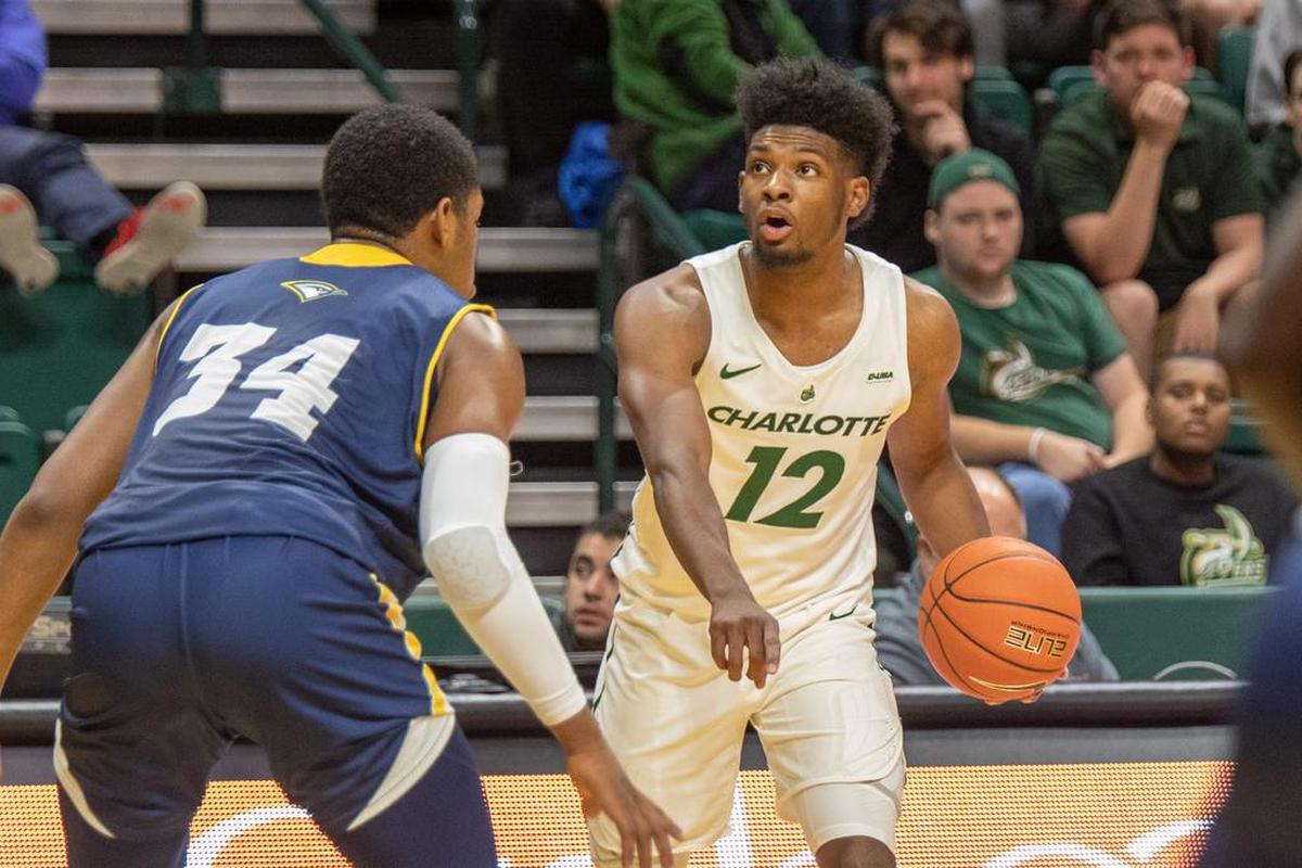 Freshman Malik Martin, right, started his first game for the Charlotte 49ers Tuesday night against Chattanooga.