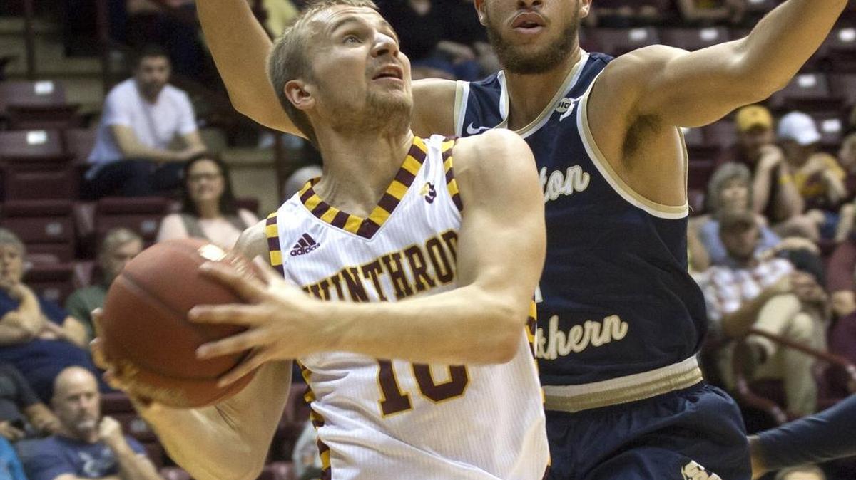 Winthrop’s Anders Broman, left in file photo, scored all 15 of his points in the second half of Thursday’s Big South Tournament win over Gardner-Webb.