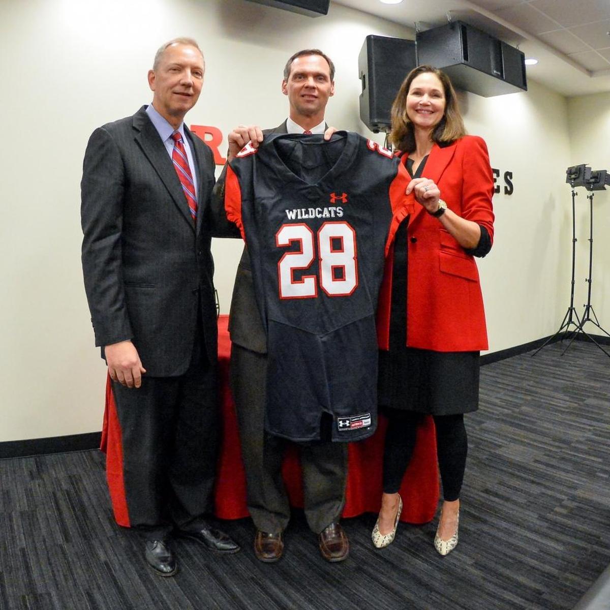 New Davidson football coach Scott Abell (center) is flanked by athletics director Jim Murphy and President Carol Quillen, who attended Wednesday’s introductory news conference at Harry L. Vance Athletic Center. Abell is the school’s 28th head football coach.
