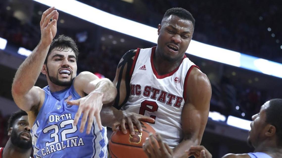 North Carolina’s Luke Maye (32), left, and N.C. State's Torin Dorn (2) are two homegrown players to watch in the 2018 NCAA tournament.