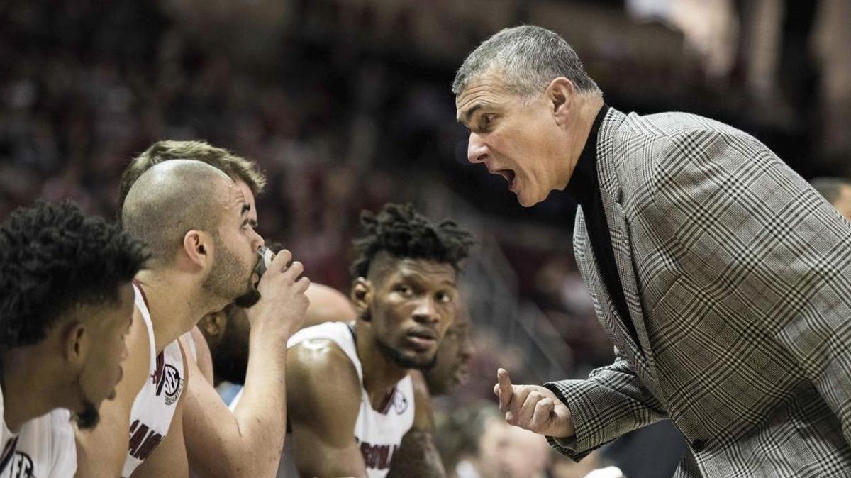 South Carolina head coach Frank Martin, right, speaks with Frank Booker, left, during the first half of Saturday’s game. Keenan Evans scored 31 points as No. 14 Texas Tech defeated the Gamecocks 70-63 in the Big 12/SEC Challenge.
