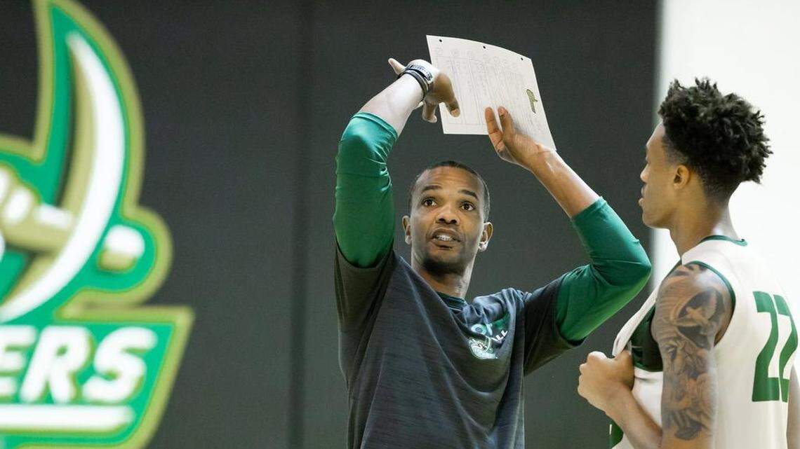 Charlotte 49ers men’s basketball coach Ron Sanchez, pictured with freshman Brandon Younger, was hired to revive a program that went 6-23 last season and hasn’t been to the NCAA tournament since 2005. His first game with the 49ers is Tuesday night, when they play host to Chattanooga.