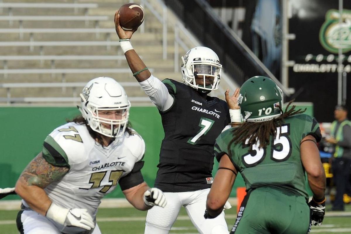 Charlotte 49ers redshirt junior quarterback Hasaan Klugh (7) throws a pass during Saturday’s spring football game at Richardson Stadium.