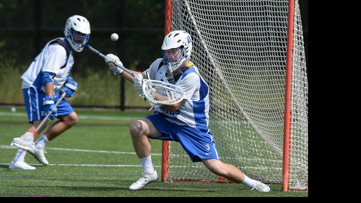 
Duke lacrosse team goalie Danny Fowler deflects a shot during practice on Wednesday, May 6, 2015 as the Blue Devils ready to defend their NCAA National Championship starting Saturday. The number five seeded Blue Devils will take on Ohio State in Durham at 7:30 pm. Fowler, a sophomore, was moved to the goalie position earlier this year and has been a main component of the Duke team's success.

