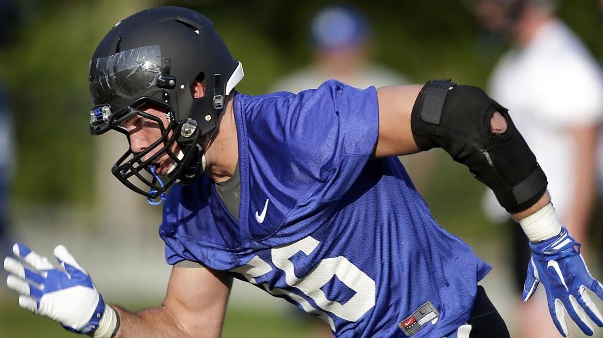 
Duke's Kyler Brown runs during the team's first NCAA college football practice of the season, Aug. 5, 2015, in Durham. 

