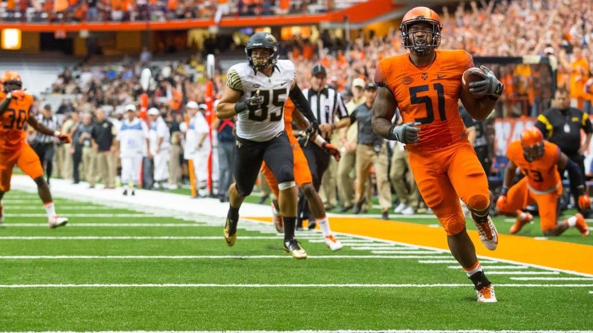 
Syracuse’s Donnie Simmons (51) runs in a interception for a touchdown during the second quarter against Wake Forest on Saturday at The Carrier Dome in Syracuse, N.Y.


