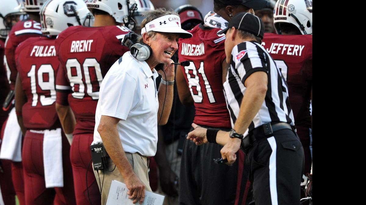 
South Carolina and coach Steve Spurrier will open the 2015 season against the Tar Heels in Charlotte on Thursday, Sept. 3.
