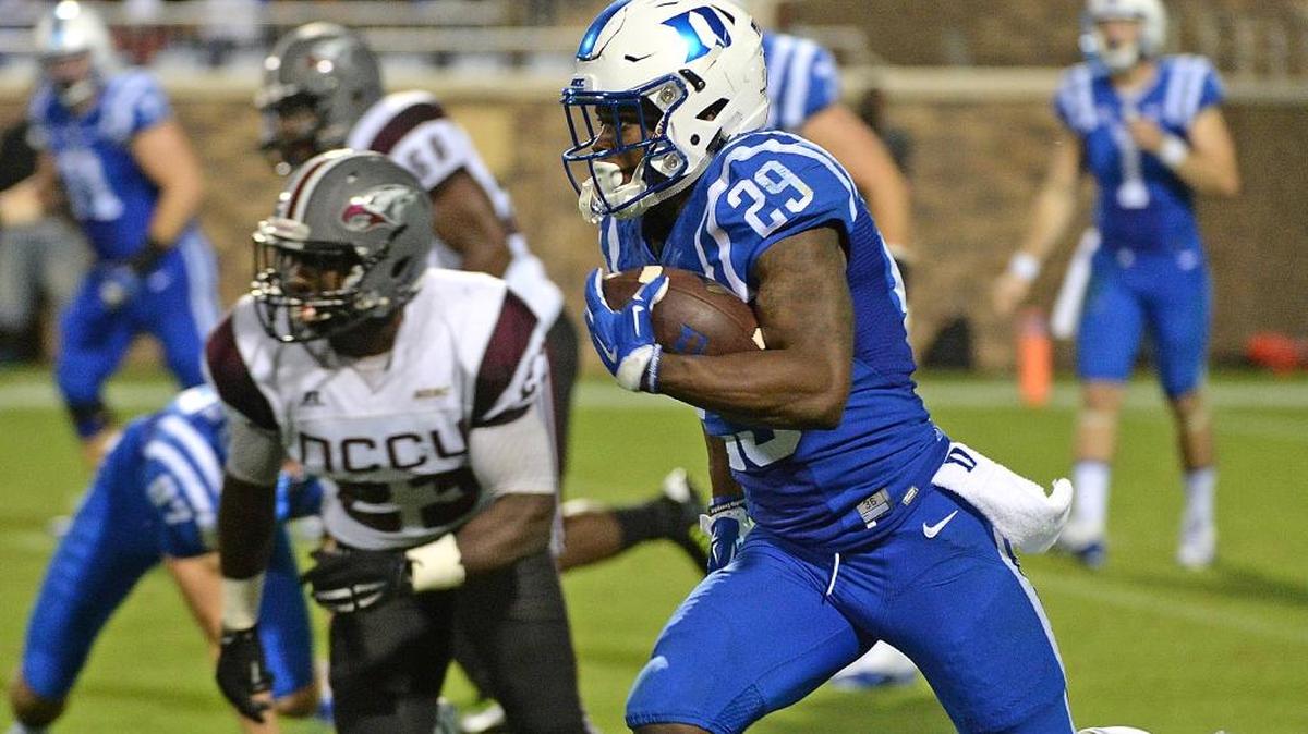 
Duke running back Shaun Wilson (29) scores a 90-yard touchdown in Duke’s 55-0 victory over NCCU at Wallace Wade Stadium Saturday, September 12, 2015. 
