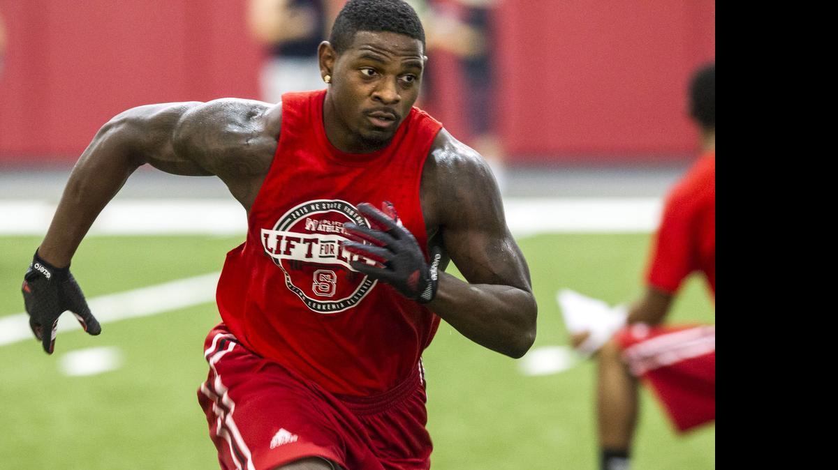 
N.C. State's Shadrach Thornton works out during a player-run workout and fundraising event to raise awareness and research dollars for leukemia Wednesday, July 22, 2015 at the Close-King Indoor Practice Facility.
