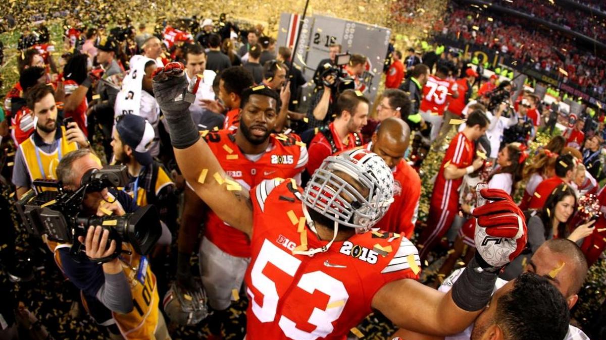 
Ohio State Buckeyes defensive lineman Michael Bennett, wearing a No. 53 jersey in honor of fallen teammate Kosta Karageorge, celebrates after defeating the Oregon Ducks 42 - 20 in the College Football Playoff National Championship Game at AT&T Stadium on Jan. 12 in Arlington, Texas.
