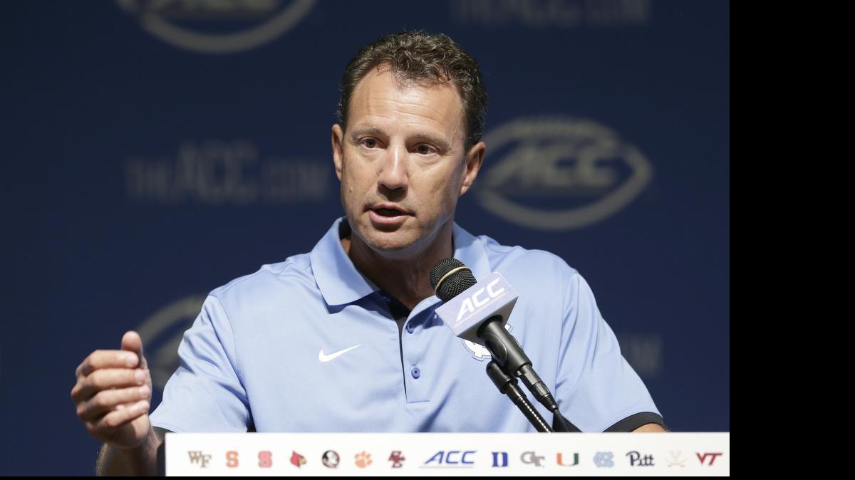 
North Carolina coach Larry Fedora responds to questions during the ACC NCAA football kickoff in Pinehurst, Tuesday, July 21, 2015.

