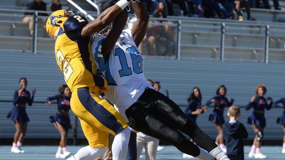 Livingstone #16 Kovarius Williams, right, breaks up a pass intended for JCSU #2 Desmond Dozier, which fell incomplete, during Saturday’s Livingstone at Johnson C. Smith CIAA football rivalry.