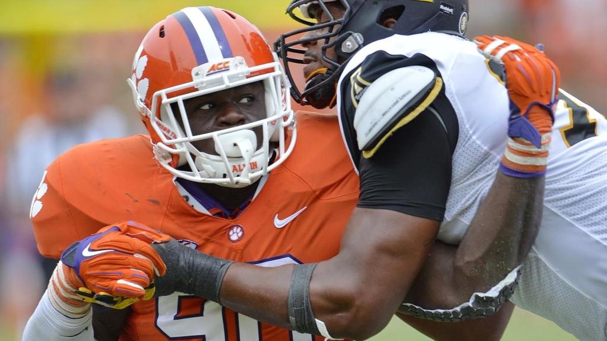 Clemson defensive lineman Shaq Lawson, left, suffered an MCL sprain in the Orange Bowl that could hinder him in the national championship game.