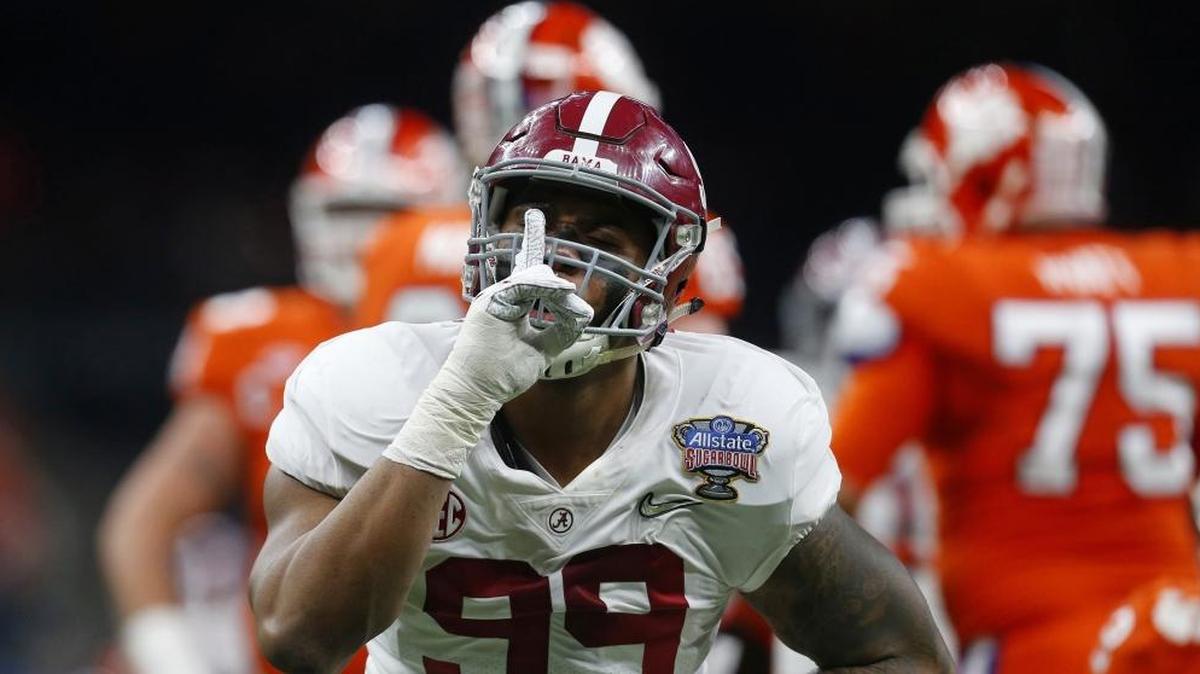Alabama defensive lineman Raekwon Davis (99) gestures after a stop in the first half of the Sugar Bowl semi-final playoff game against Clemson for the NCAA college football national championship, in New Orleans, Monday, Jan. 1, 2018. (AP Photo/Butch Dill)