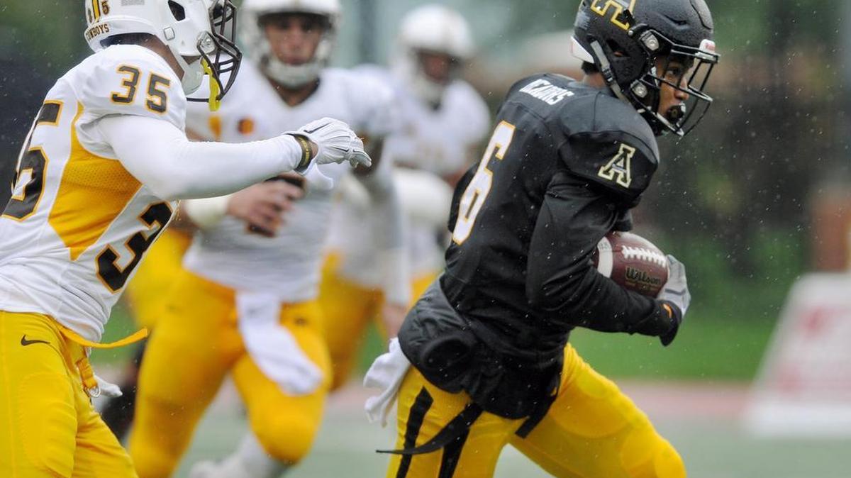 Appalachian State wide receiver Shaedon Meadors, right, gets ahead of Wyoming defender Marcus Epps during the first half of an Oct. 3 home game.