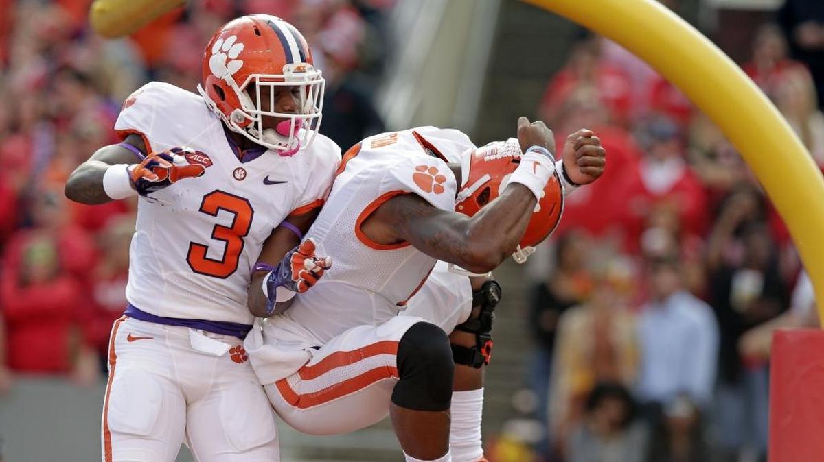 Clemson's Artavis Scott (3) and Deshaun Watson celebrate Watson's touchdown Saturday in the first half.