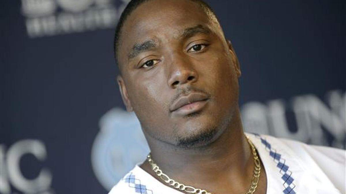North Carolina quarterback Marquise Williams listens to a question during the team's NCAA college football media day in Chapel Hill, N.C., Wednesday, Aug. 12, 2015. Williams has been the run-pass threat driving the Tar Heels' offense, and has another chance to put up big numbers as a senior.