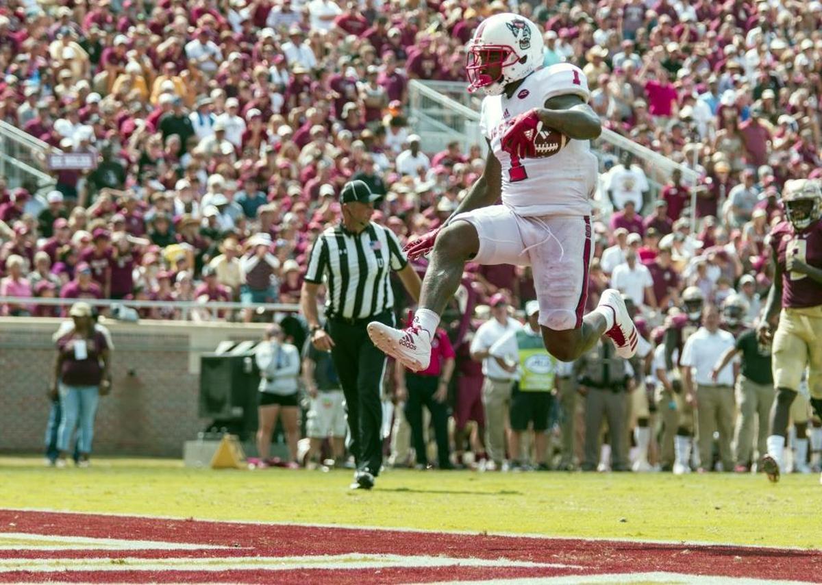 North Carolina State's Jaylen Samuels, a former Mallard Creek star, celebrates as he scores against Florida State in the second half of an NCAA college football game in Tallahassee, Fla., Saturday, Sept. 23, 2017. NC State defeated Florida State 27-21. (AP Photo/Mark Wallheiser)