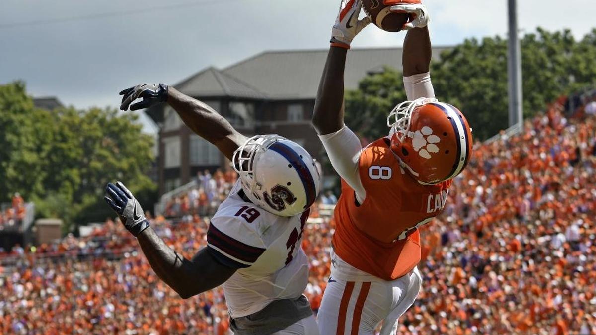 Clemson's Deon Cain, right, pulls in a pass for a touchdown while being defended by S.C. State's Devondre Powell in Clemson’s 59-0 win in 2016