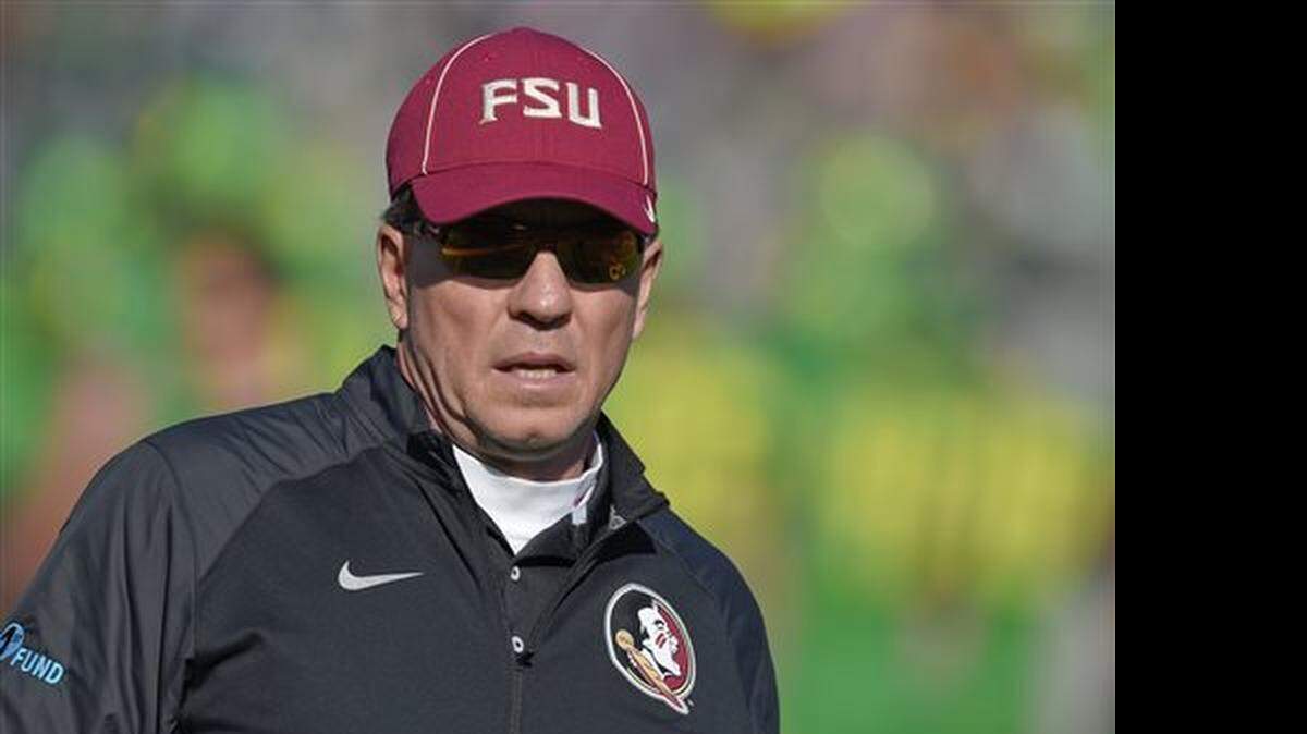 Florida State head coach Jimbo Fisher looks on before his team faces Oregon in the Rose Bowl NCAA college football playoff semifinal, Thursday, Jan. 1, 2015 in Pasadena, Calif.