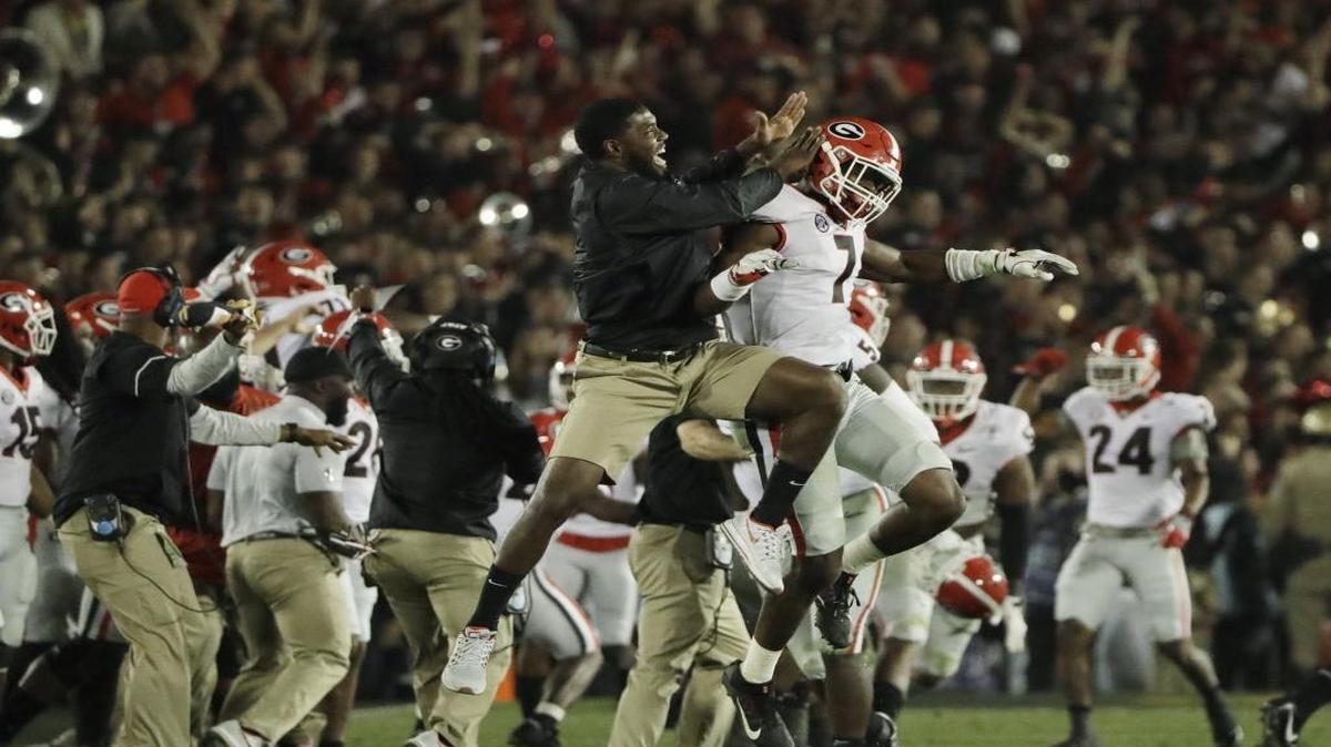 Georgia linebacker Lorenzo Carter (7) celebrates after blocking a field goal against Oklahoma during overtime in the Rose Bowl NCAA college football game Monday, Jan. 1, 2018, in Pasadena, Calif. Georgia won 54-48. (AP Photo/Gregory Bull)