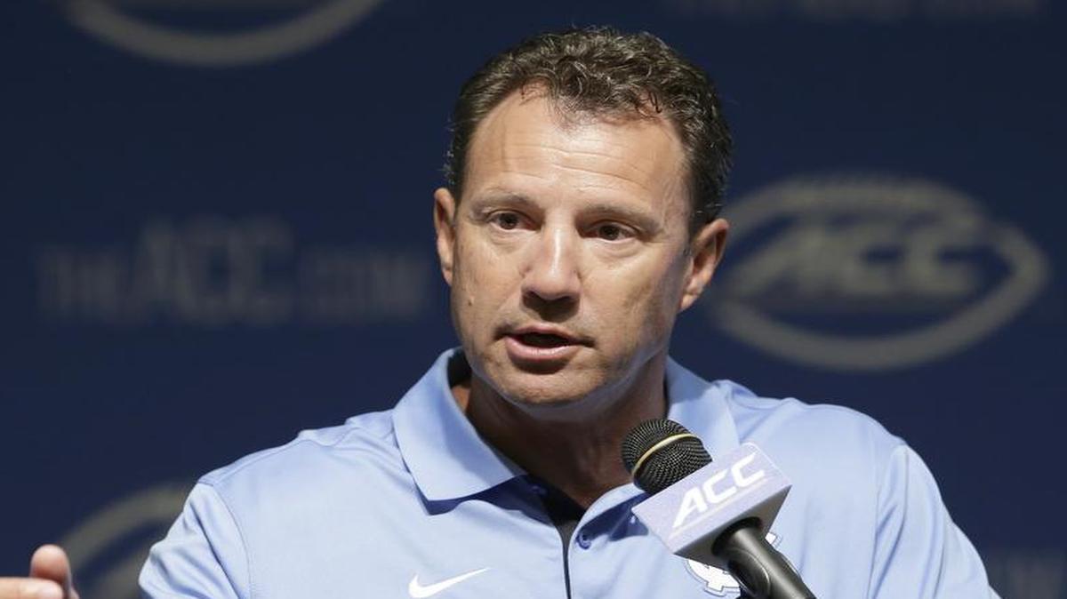 
North Carolina coach Larry Fedora responds to questions during the ACC NCAA football kickoff in Pinehurst, Tuesday, July 21, 2015.
