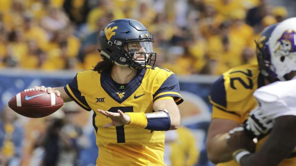 West Virginia quarterback Will Grier (7) had more than 300 yards total offense against East Carolina Saturday
