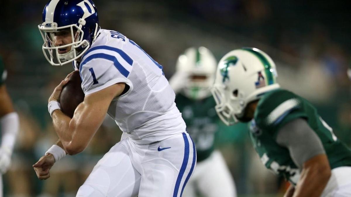 
Thomas Sirk (1) of the Duke Blue Devils runs with the ball against the Tulane Green Wave on Sept. 3 in New Orleans. 
