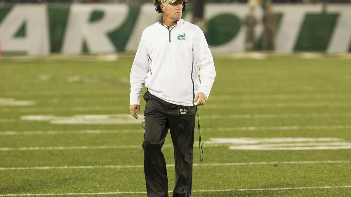 Charlotte 49ers head coach Brad Lambert walks the field while waiting for overtime to begin against UTSA during a college football game Saturday, November 14, 2015 at UNCC. The Roadrunners won 30 - 27 in overtime. Photo by JASON E. MICZEK - Special to the Observer