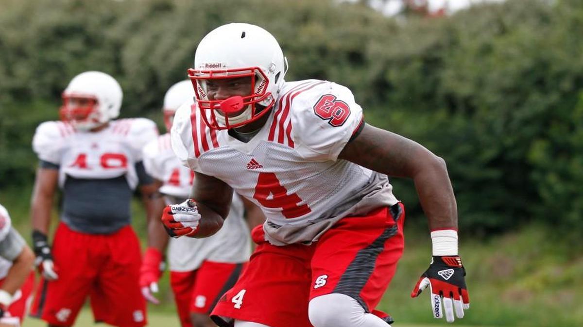 
N.C. State’s linebacker Jerod Fernandez (4) goes through drills. Fernandez returns at the middle or “mike” linebacker this season after 78 tackles in 12 games last season.
