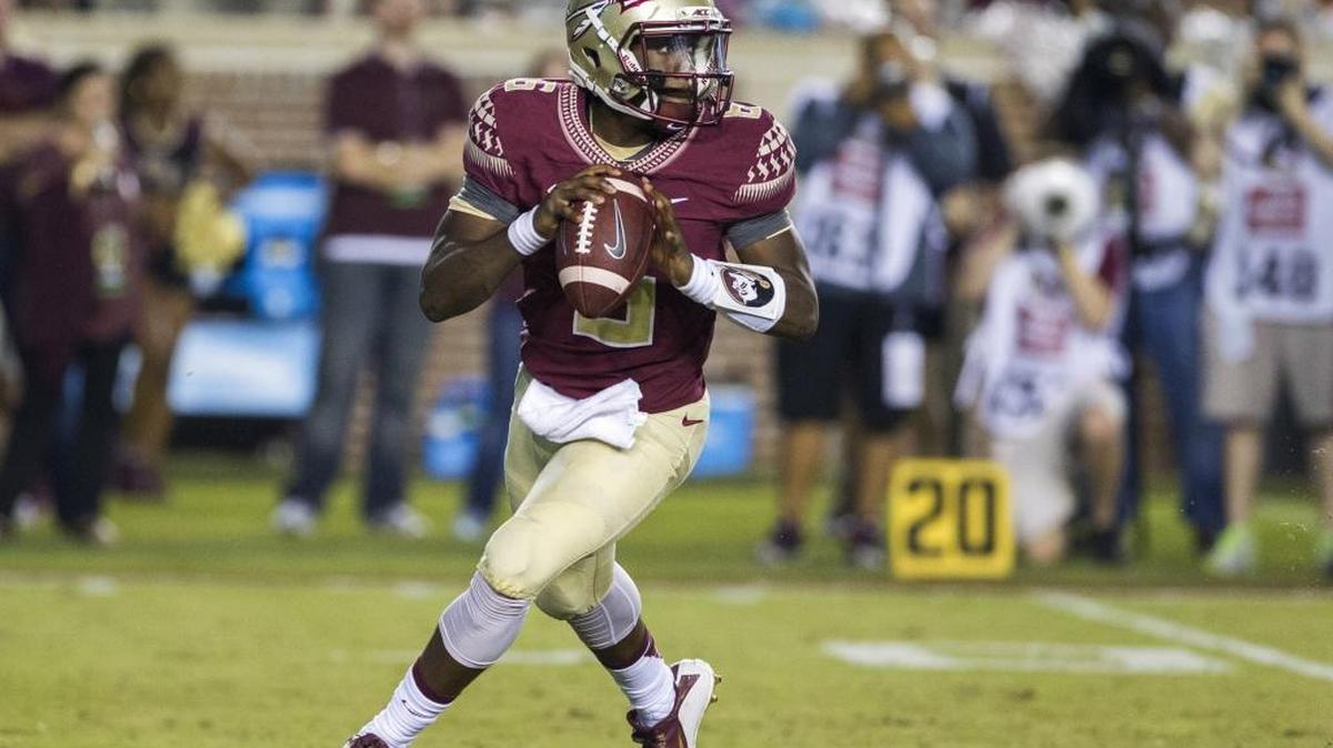 
Florida State quarterback Everett Golson rolls out to pass during the first half of an NCAA college football game against Texas State in Tallahassee, Fla., Saturday.
