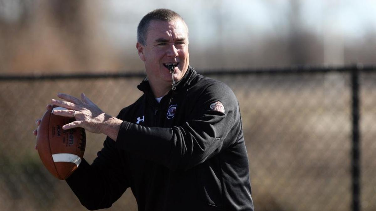 
Former App State player and coach Shawn Elliott was named University of South Carolina interim head coach after Steve Spurrier announced his retirement.
