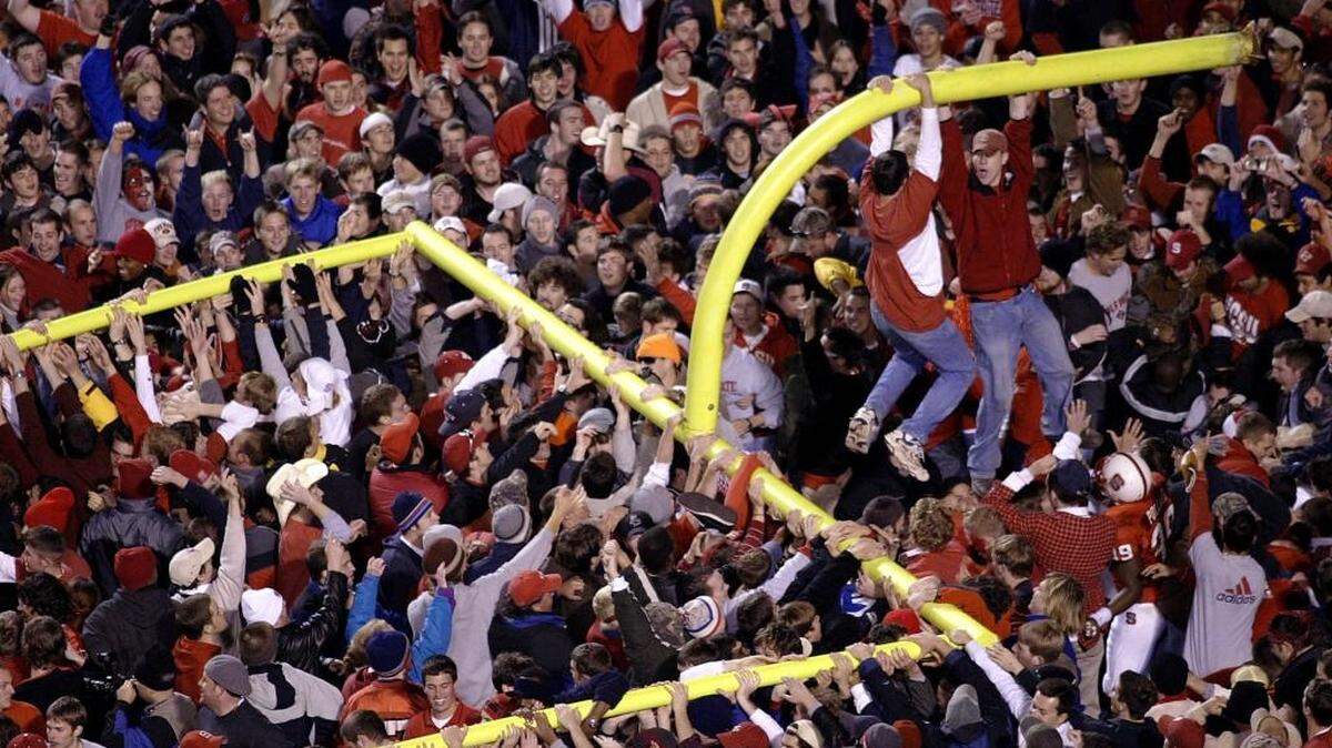 
Fans tear down the goalposts after North Carolina State's 17-7 upset of No. 14 Florida State Saturday, Nov. 23, 2002, at Carter-Finley Stadium in Raleigh, N.C. 
