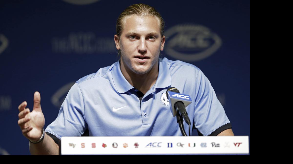 
North Carolina's Jeff Schoettmer responds to questions during the ACC NCAA college football kickoff in Pinehurst, Monday, July 20, 2015. 
