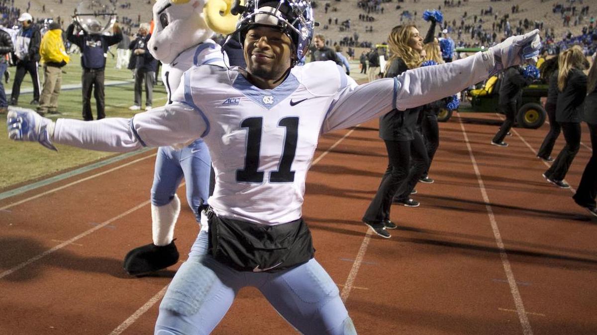 
UNC's Malik Simmons (11) celebrates following the Tar Heels' 45-20 victory over Duke on  Nov. 19, 2014 at Wallace Wade Stadium in Durham.
