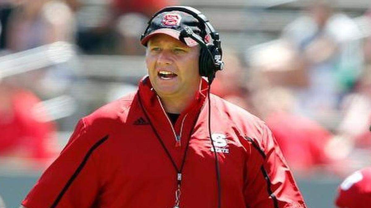 
N.C. State head coach Dave Doeren yells to his team during the 2015 Kay Yow Spring Game at Carter-Finley Stadium in Raleigh, N.C., Saturday, April 11, 2015. Red won the game 16-3. 
