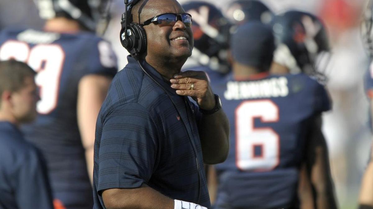 
Head coach Mike London of the Virginia Cavaliers watches the score board during their game again the Brigham Young Cougars at LaVell Edwards Stadium on September 20, 2014 in Provo, Utah. 
