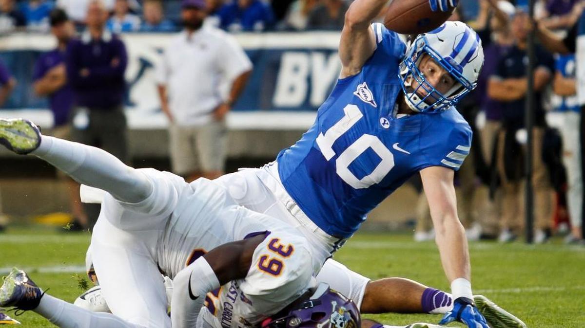 
BYU wide receiver Mitch Mathews (10) dives into the end zone for a touchdown against East Carolina during the first half in an NCAA college football game, Saturday, Oct. 10, 2015 in Provo, Utah.

