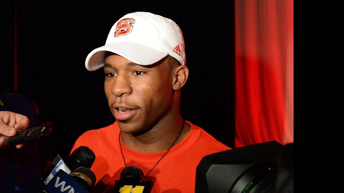 
Garner running back Nyheim Hines, the No. 2 rated all-purpose back in the country, speaks with the media after he announced he will be attending N.C. State, December 19, 2014. 
