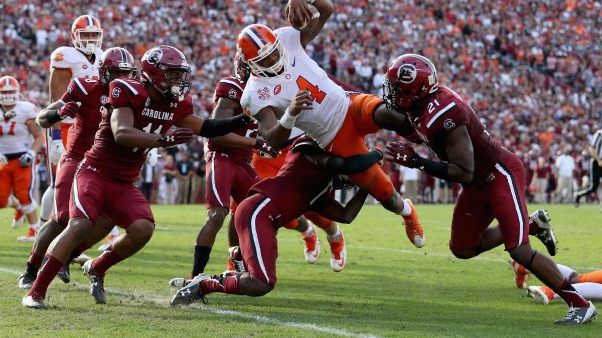 Clemson quarterback Deshaun Watson (4) dives for a touchdown during Saturday’s game against the South Carolina Gamecocks in Columbia, S.C.