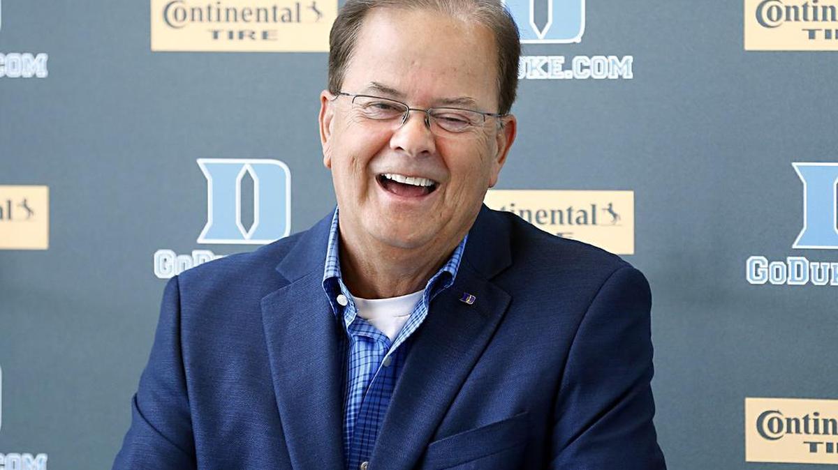 
Head coach David Cutcliffe laughs as he speaks to the media before Duke's first football practice of the season at the school campus in Durham, Aug. 5, 2015.
