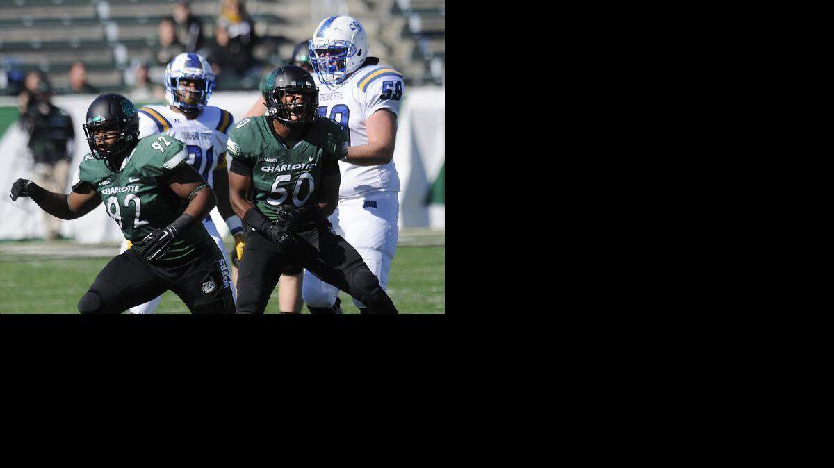 
Charlotte 49ers linebacker Karrington King (50) exults after sacking the Morehead State quarterback in a 2014 game.


