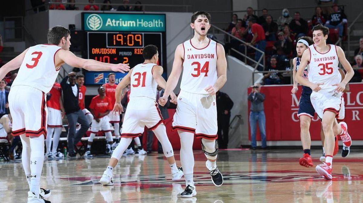 Davidson freshman Luke Frampton (34) reacts after hitting one of his eight 3-pointers against Richmond late in the second half of Saturday’s Atlantic 10 men’s basketball game at Belk Arena. Frampton finished with 24 points in the Wildcats’ 75-62 victory.