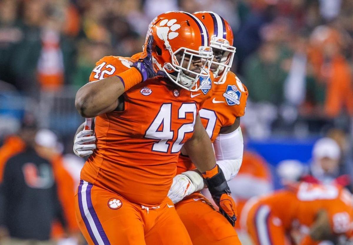 Clemson Tigers defensive lineman Christian Wilkins (42) celebrates a tackle during of the first half of the ACC Championship Game in Charlotte on Saturday. He finished with seven tackles and two pass deflections.