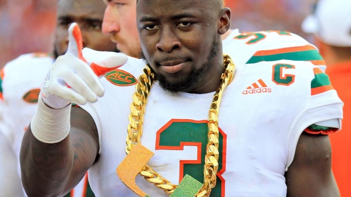 Miami’s turnover chain -- worn here by defensive back Dee Delaney -- has become a major discussion point in college football this season.