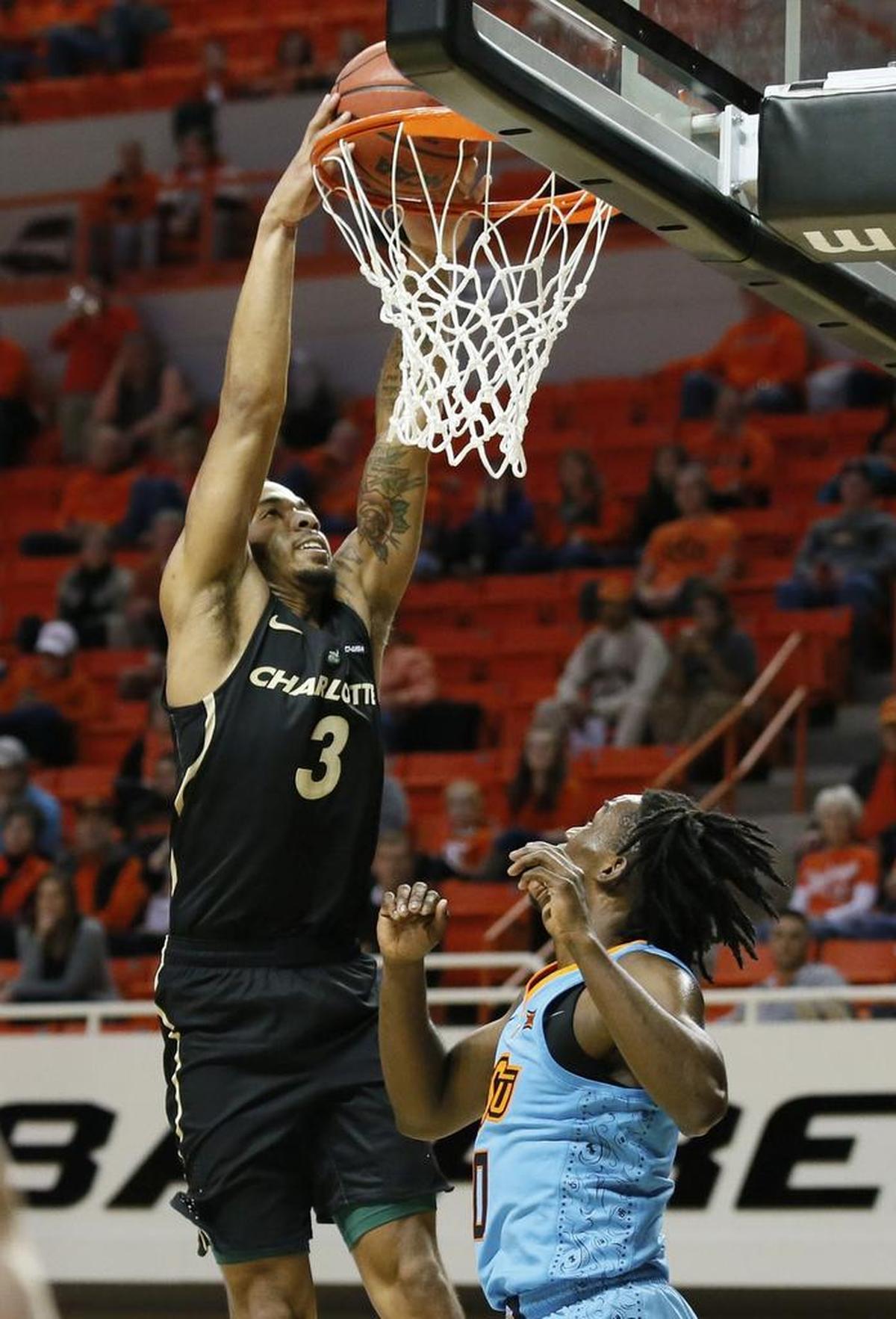 Charlotte guard Jon Davis (3) reached the 1,000-point mark for his career in the first half. He is the 27th 49ers player with 1,000 or more points.