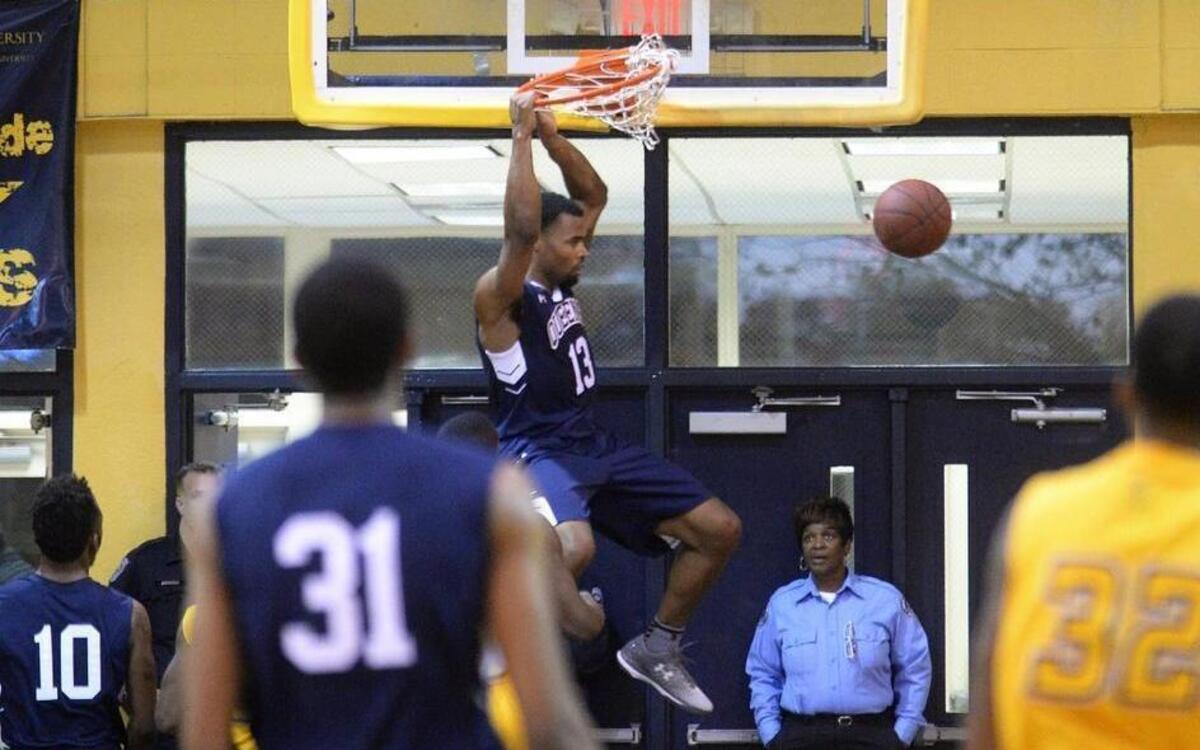 Daniel Camps (13) scored a career-high 29 points Sunday and Queens shut down the high-powered Lincoln Memorial offense down the stretch, lifting the Royals to their first South Atlantic Conference tournament title.