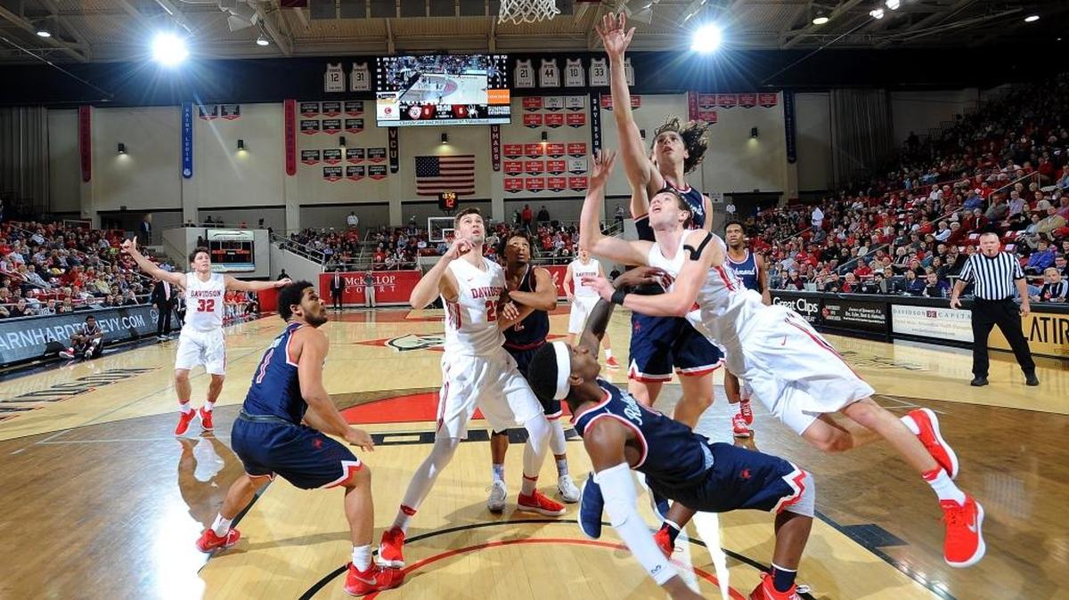 Davidson sophomore guard Jon Axel Gudmundsson (03) drives and is fouled by Richmond’s De’Monte Buckingham (11) early in the first half of Sunday’s Atlantic 10 game at Belk Arena. Gudmundsson finished with a team high 21 points in the Wildcats 66-63 loss.
